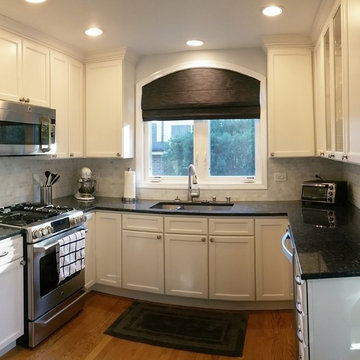 White Kitchen With Blue Pearl Granite Counters