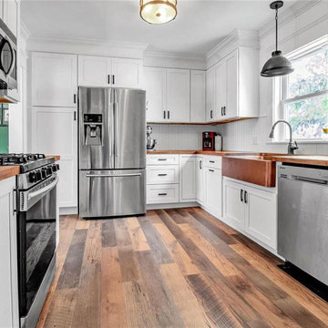 White Kitchen with Copper Farmhouse Sink