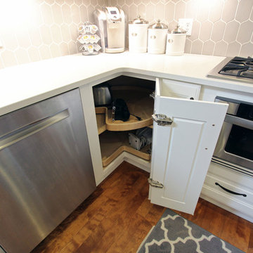 White Kitchen with Espresso Island and Eternia Caringdale Quartz Countertop