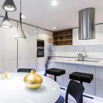 White kitchen with golden oak