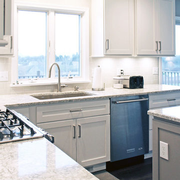White Kitchen with Gray Island