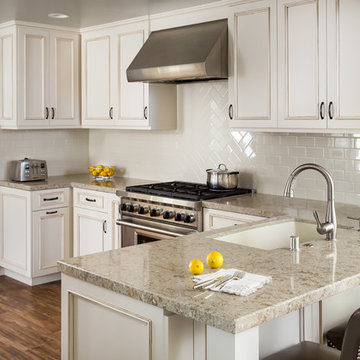 White Kitchen with Herringbone subway tile