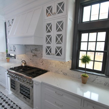 White Kitchen with Marble Floor