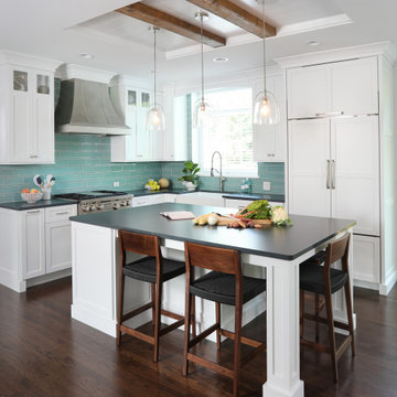 White Kitchen with Reclaimed Wood Accents and Dash of Blue