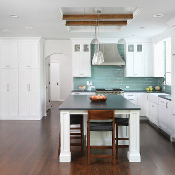 White Kitchen with Reclaimed Wood Accents and Dash of Blue