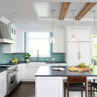 White Kitchen with Reclaimed Wood Accents and Dash of Blue