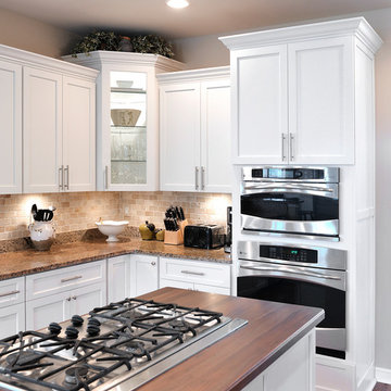 White Kitchen with Walnut Wood Counter Tops in Ashburn, VA