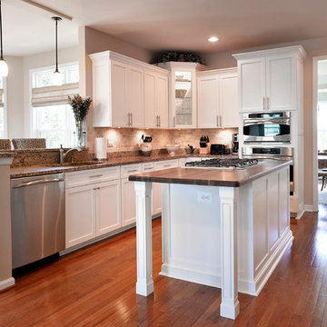 White Kitchen with Walnut Wood Counter Tops in Ashburn, VA