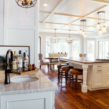 White Kitchen with Warm Wood Floors