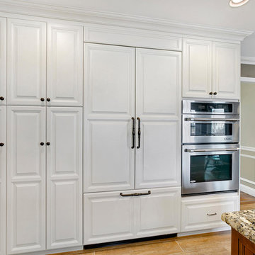 White Kitchen with Wood Stained Island Frameless Cabinets