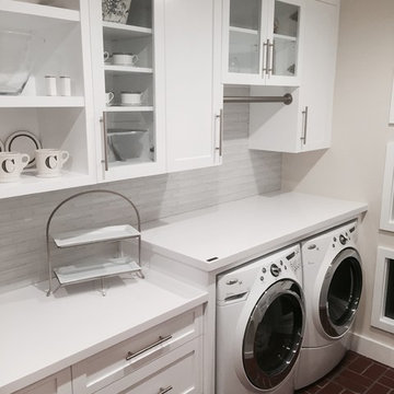 White laundry room by Colombara's Cabinet and Millwork