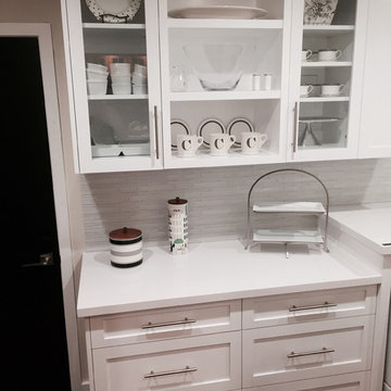 White laundry room by Colombara's Cabinet and Millwork