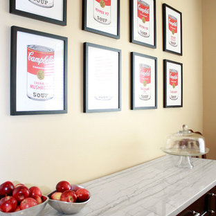 Mid-sized contemporary eat-in kitchen designs - Inspiration for a mid-sized contemporary l-shaped light wood floor eat-in kitchen remodel in Philadelphia with shaker cabinets, dark wood cabinets, quartzite countertops, a farmhouse sink, white backsplash, stone tile backsplash, stainless steel appliances and an island