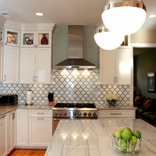 Mid-sized contemporary eat-in kitchen designs - Eat-in kitchen - mid-sized contemporary l-shaped light wood floor eat-in kitchen idea in Philadelphia with a farmhouse sink, shaker cabinets, white cabinets, quartzite countertops, white backsplash, stone tile backsplash, stainless steel appliances and an island