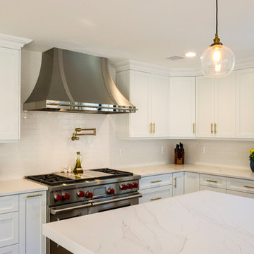 White Modern Kitchen with Compac Quartz Counters and Island