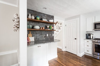 White painted kitchen design, open shelving, dark flooring