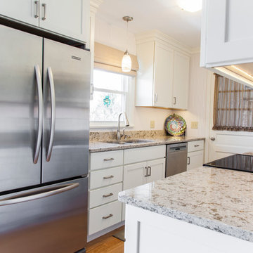White Painted Shaker Galley Kitchen with Quartz countertops