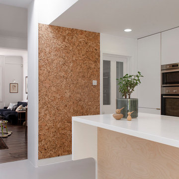 White, plywood and cork kitchen