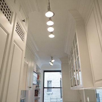 White Prewar Kitchen and Ceiling Track Lighting