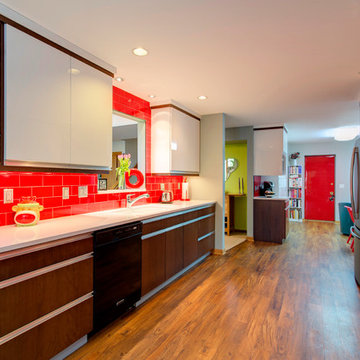 White quartz countertops and bright red subway tile..WOW!
