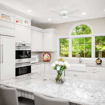 White raised panel kitchen with chocolate glaze