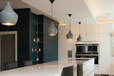 Inspiration for a large contemporary kitchen in Sussex.