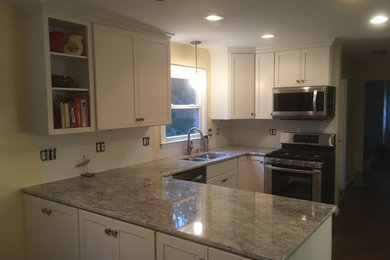 Kitchen photo in Cincinnati with shaker cabinets and white cabinets