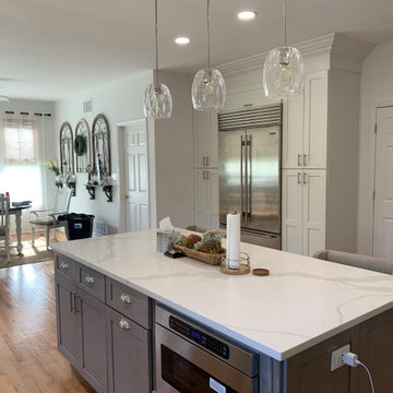 white shaker kitchen cabinets combine with grey shaker cabinets .
