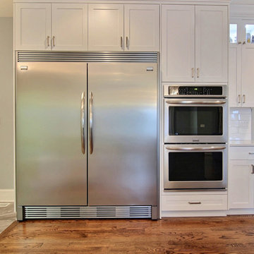 White Shaker Style Cabinetry with Built In Oven Case