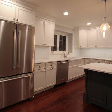 White Shaker Style Cabinetry with Stainless Hardware