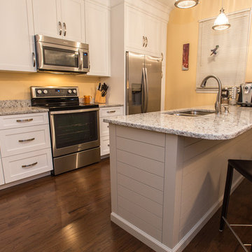 White Shaker Style Kitchen Cabinets with Shiplap Style Island