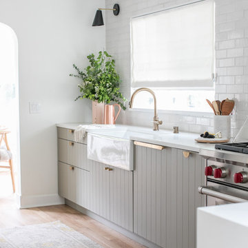 White Thin Brick Backsplash with Sage Cabinets