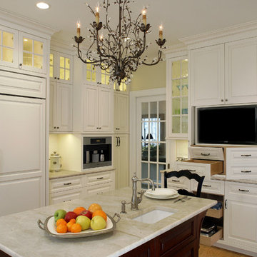 White tradional kitchen with TV hutch