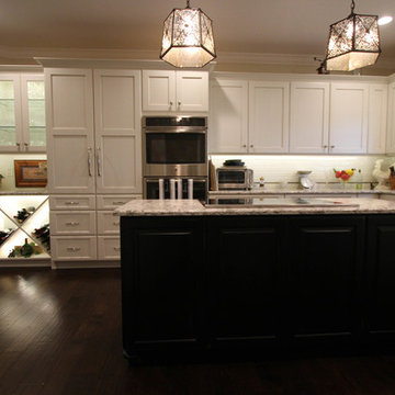 White Traditional Cabinets and Dark Wood Island
