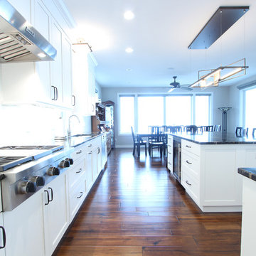 White Transitional Kitchen with White Glass Backsplash & Professional Appliances