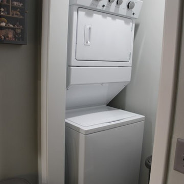 White Upper Cabinet and Gray Base Cabinet Kitchen With Quartz Counters