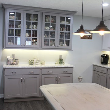White Upper Cabinet and Gray Base Cabinet Kitchen With Quartz Counters