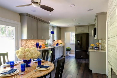 Example of a large trendy eat-in kitchen design in Boston