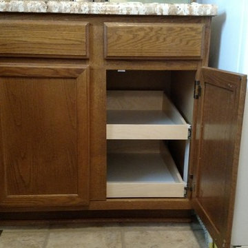 Wide slide out shelf installed in cabinet with center stile removed