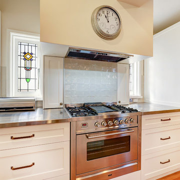 Traditional kitchen with stainless steel benchtop