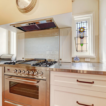 Traditional kitchen with stainless steel benchtop