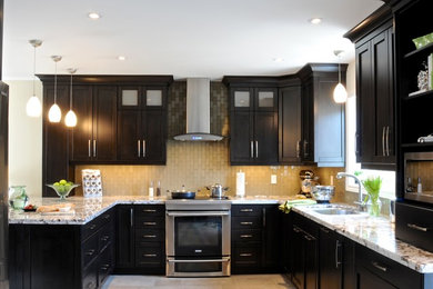 Example of a transitional kitchen design in Vancouver