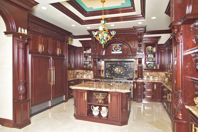 Eat-in kitchen - large traditional u-shaped marble floor eat-in kitchen idea in Miami with an undermount sink, raised-panel cabinets, dark wood cabinets, granite countertops, multicolored backsplash, stone slab backsplash, stainless steel appliances and an island
