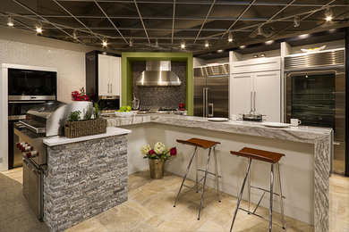 Example of a kitchen design in Phoenix with stainless steel appliances