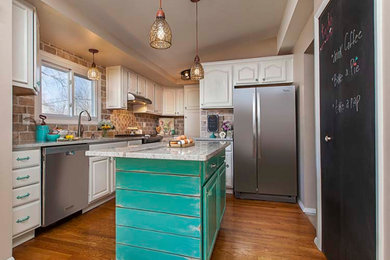 Example of a beach style kitchen design in Detroit