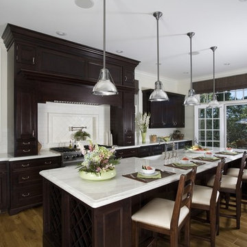 Wood Mode Cherry Recessed Kitchen Cabinetry with Calcutta Polished Countertops