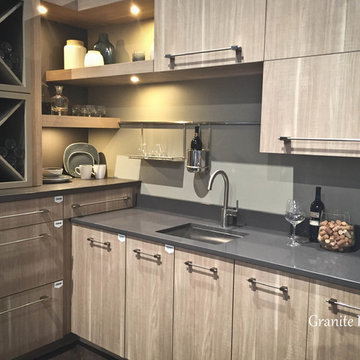Wooden Cabinets paired with Concrete Quartz.  Multi Level Surfaces 2016 Trend!