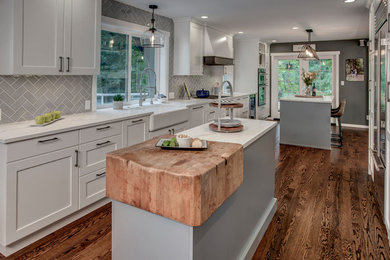 Inspiration for a country single-wall kitchen remodel in Seattle with a farmhouse sink and mosaic tile backsplash