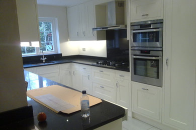 Photo of a beach style kitchen in Surrey.