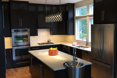 Example of a minimalist kitchen design in Burlington